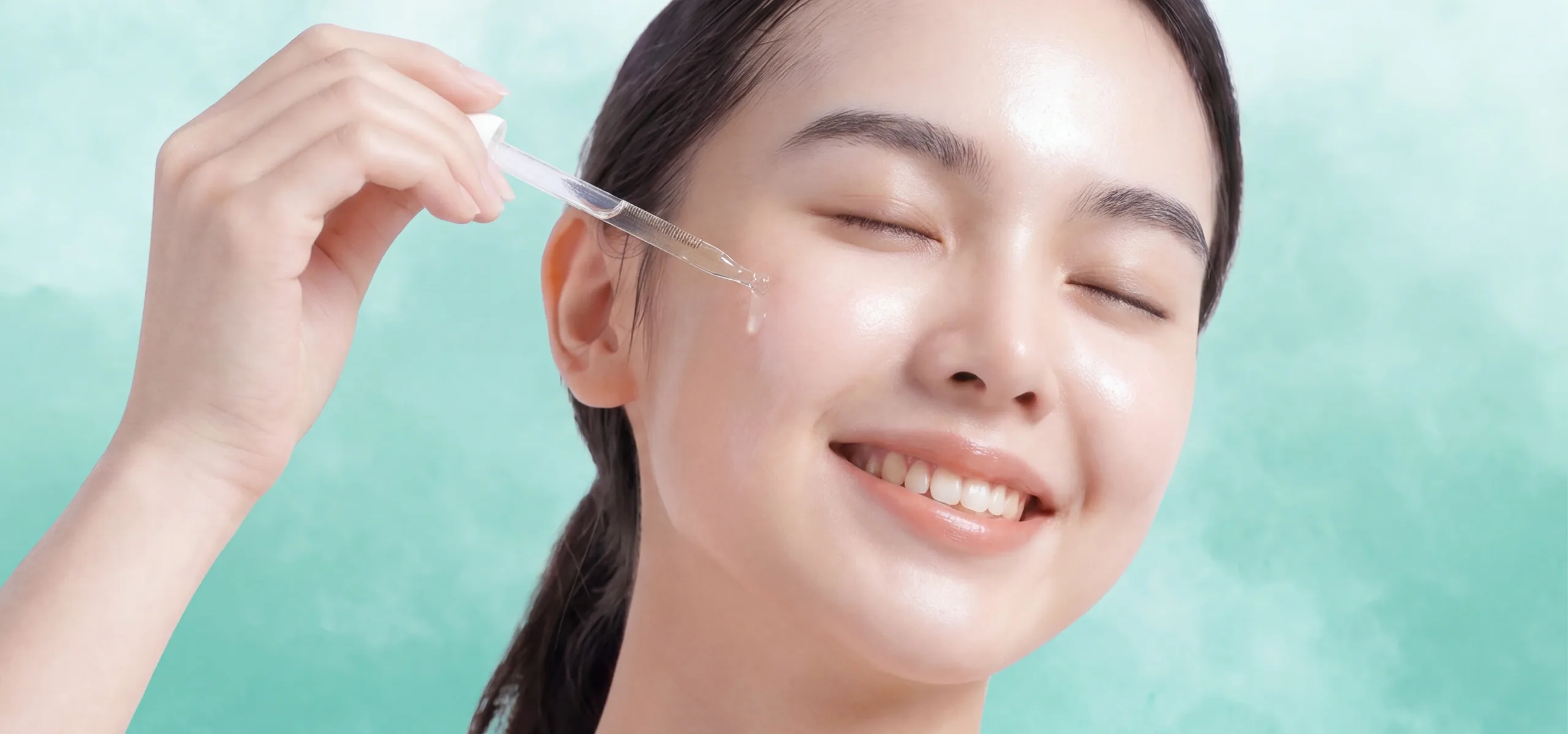 Gentle serum application on real skin with precision dropper