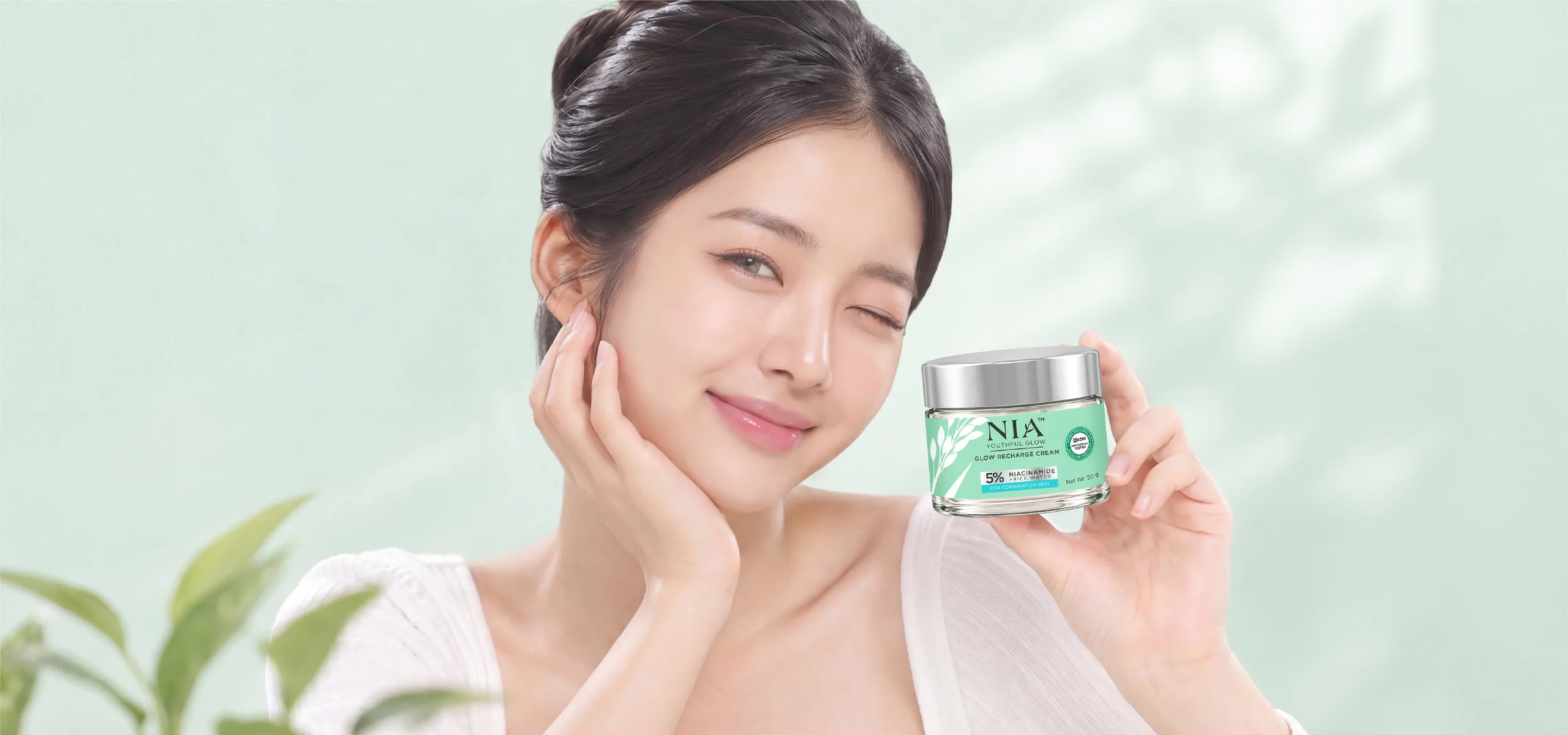 NIA Youthful Glow Recharge Cream jar with radiant model